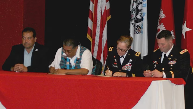 Tribal leaders at a signing with the US military